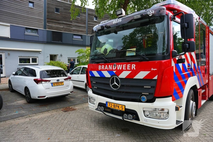 Rookontwikkeling door defecte wasmachine