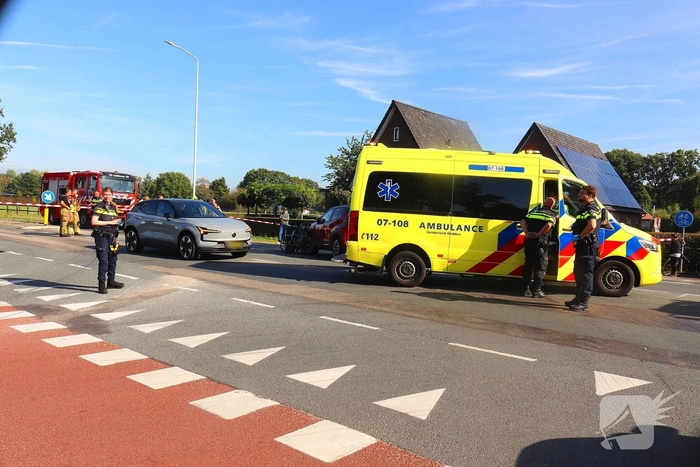 Driewielerduofiets en auto botsen