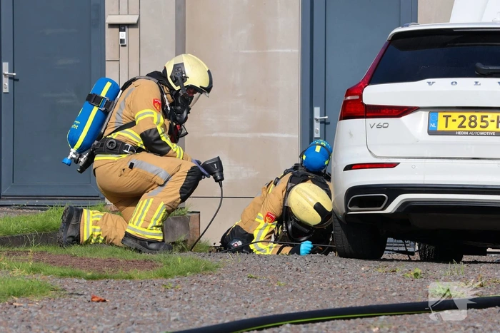 Hybride auto in brand door accupakket