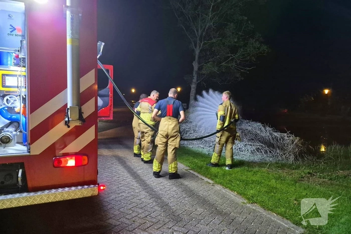 Brandende takken snel geblust