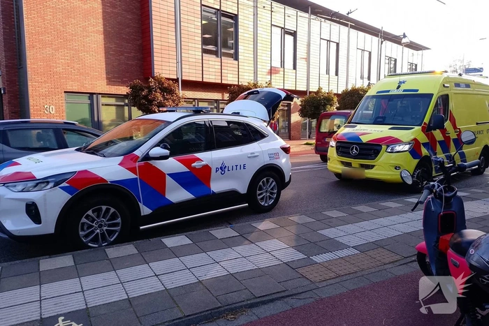 Ongeval met fietser in drukke straat