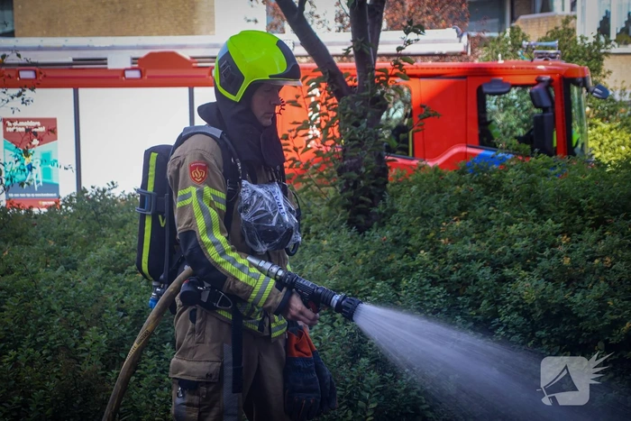 Karton in brand gezet naast speeltoestel