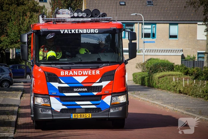 Karton in brand gezet naast speeltoestel