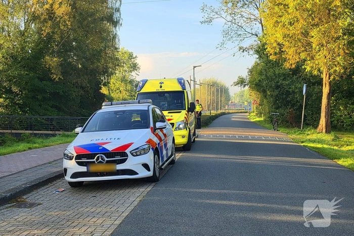 Scooterrijder en fietser in botsing
