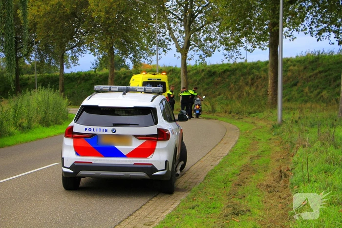 Scooterrijder gewond na ongeval in bocht