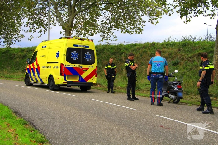 Scooterrijder gewond na ongeval in bocht