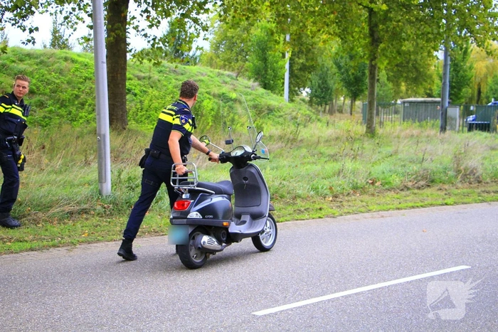 Scooterrijder gewond na ongeval in bocht