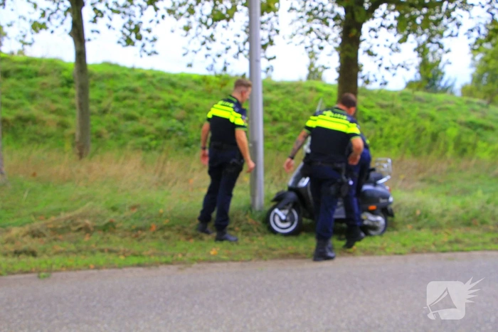 Scooterrijder gewond na ongeval in bocht