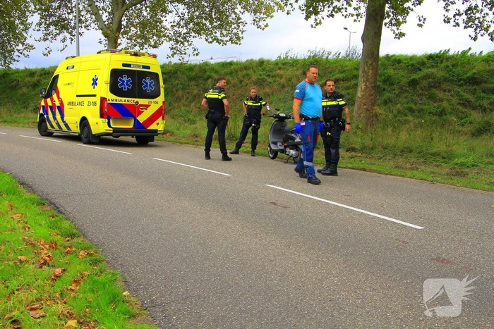 Scooterrijder gewond na ongeval in bocht