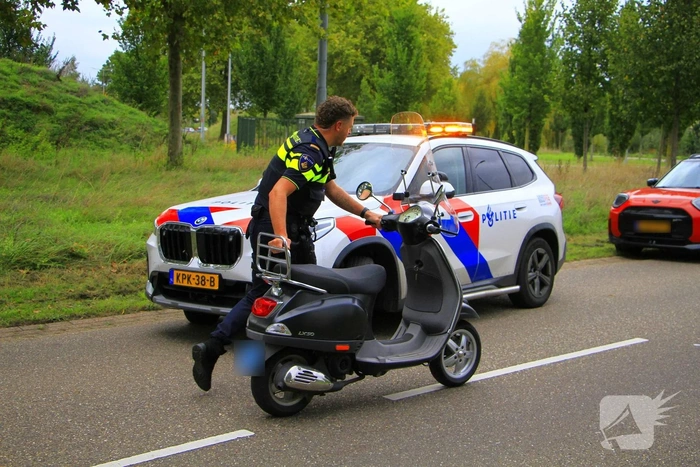 Scooterrijder gewond na ongeval in bocht