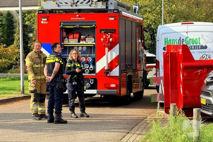 Brand door dakdekkers op woning
