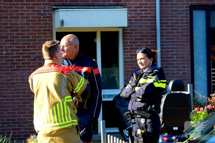 Raam licht uit woning door brand