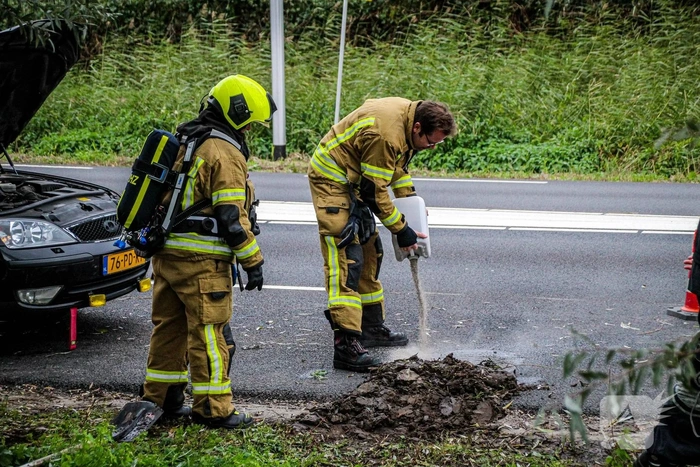 Rookontwikkeling door vloeistoffen op motor auto