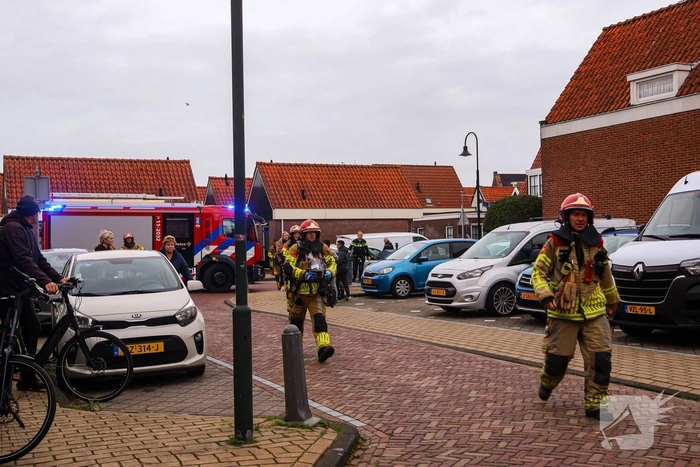 Bewoner ontdekt brand in eigen huis