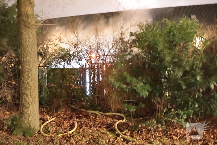 Forse brand in achtertuin woning