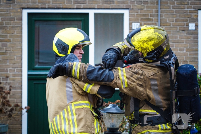 Bewoners niet thuis tijdens zolderbrand, twee katten gered