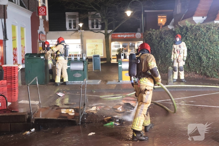 Containerbrand achter winkel snel geblust