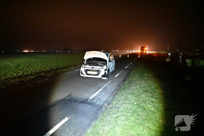 Frontale aanrijding tussen tractor en auto