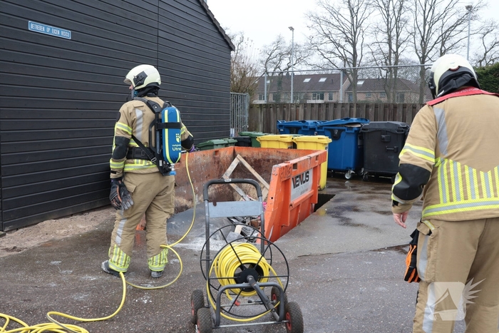 Brand in afvalcontainer bij hockeyvereniging