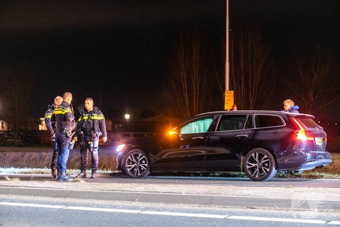 Aanrijding tussen twee auto's met aanhouding