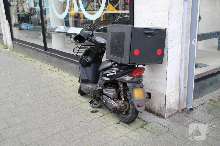 Ongeval tussen scooter en auto