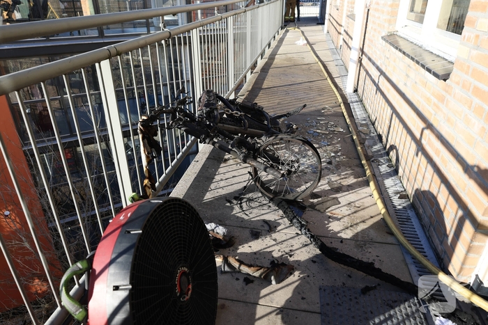 Politie pakt bewoner na woningbrand