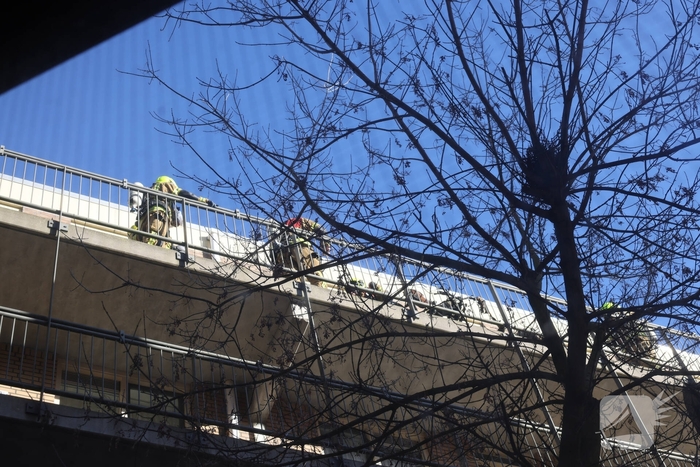 Politie pakt bewoner na woningbrand