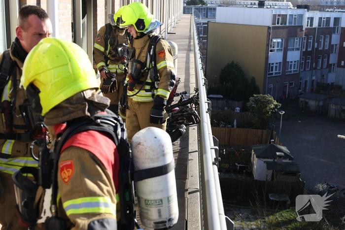 Politie pakt bewoner na woningbrand
