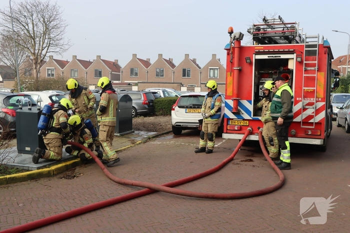 Brand in ondergrondse afvalcontainer geblust