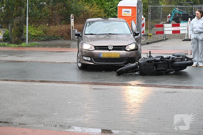 Ongeval tussen scooter en auto
