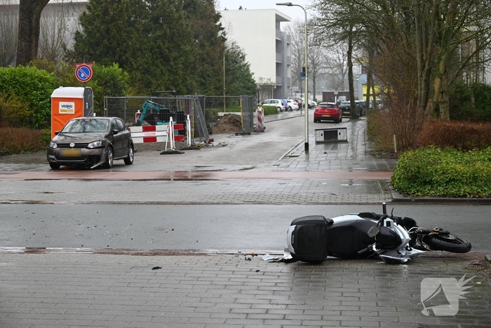 Ongeval tussen scooter en auto