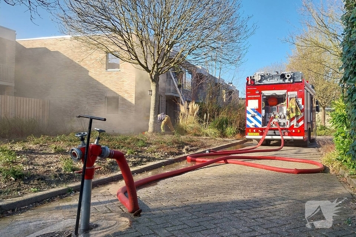 Forse rookontwikkeling bij woningbrand