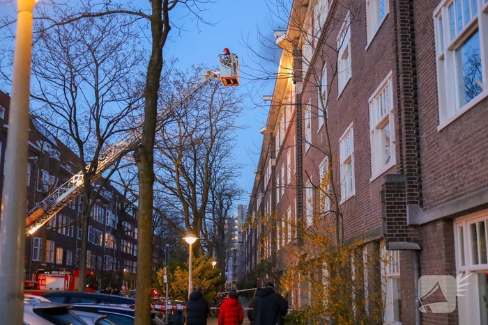 Brand in portiekwoning geblust