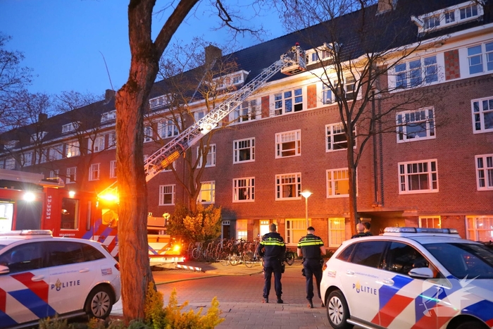 Brand in portiekwoning geblust