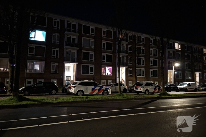 Kogelgaten in ramen van woning