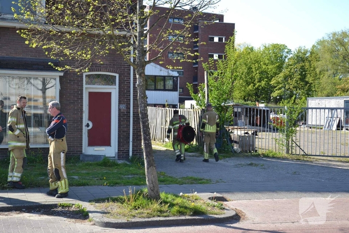 Deur geramd door brandweer bij gasincident