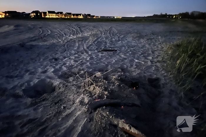 Buitenbrand geblust aan strand