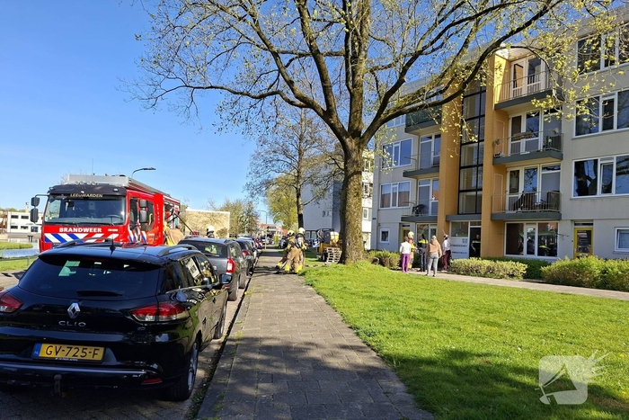 Brand op balkon van portiekwoning