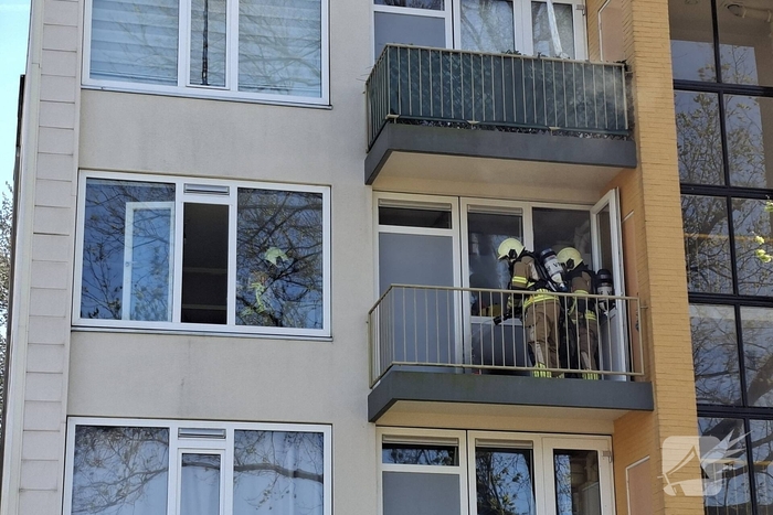Brand op balkon van portiekwoning