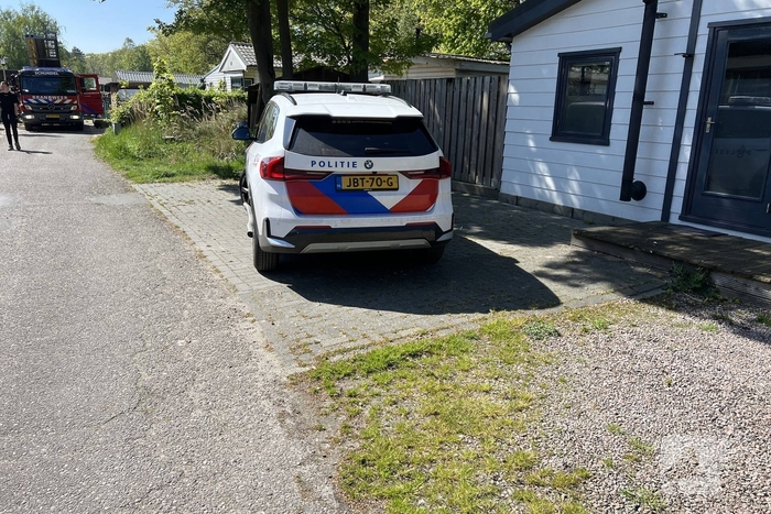 Brand door barbecue onder overkapping