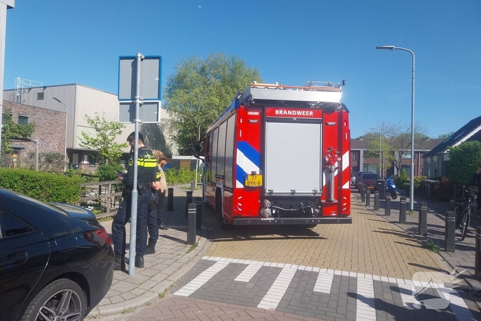 Brandweer in actie bij woningbrand