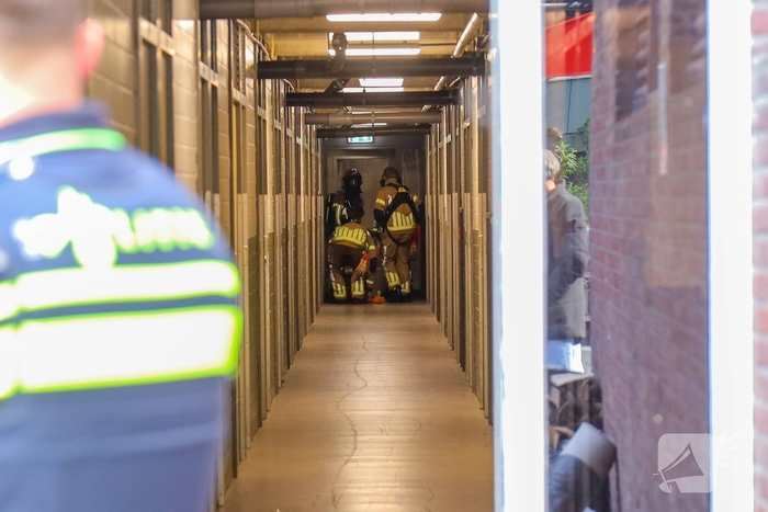 Brand in flatwoning onder controle