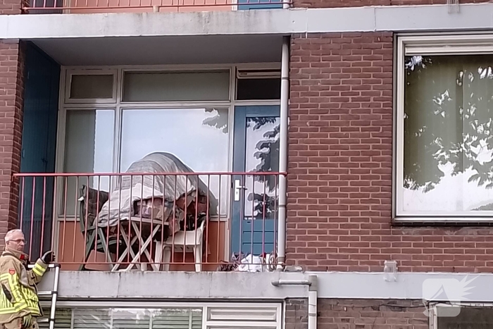 Kaars op balkon zorgt voor inzet van brandweer