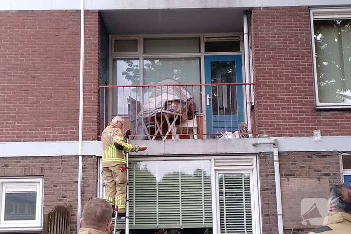 Kaars op balkon zorgt voor inzet van brandweer
