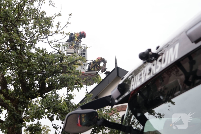 Brand in schoorsteen van woning