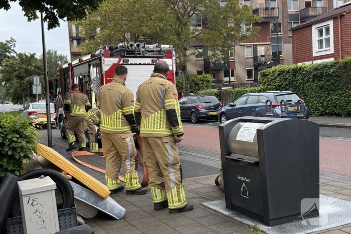 Ondergrondse container in brand