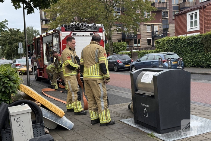 Ondergrondse container in brand