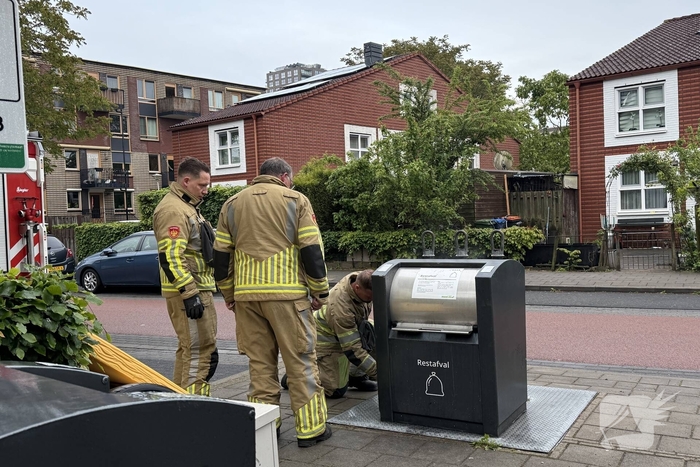 Ondergrondse container in brand