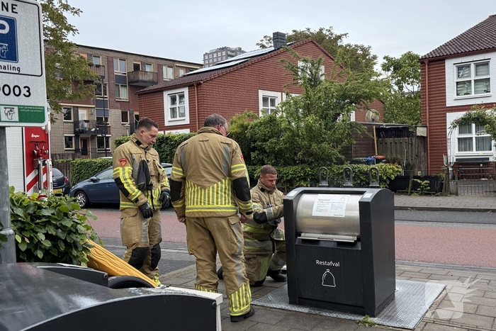 Ondergrondse container in brand