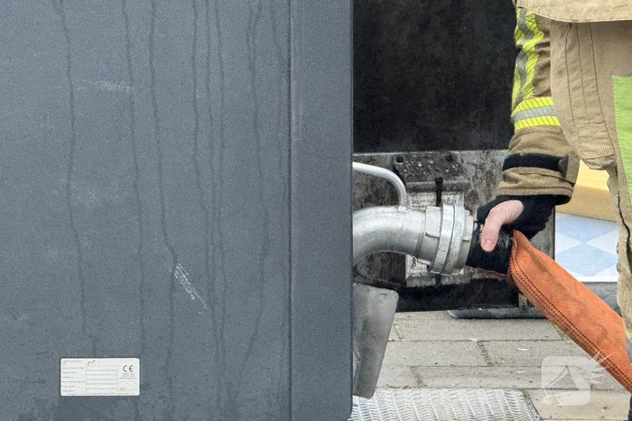 Ondergrondse container in brand